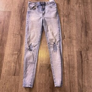 Women's Distressed Blue Jeans